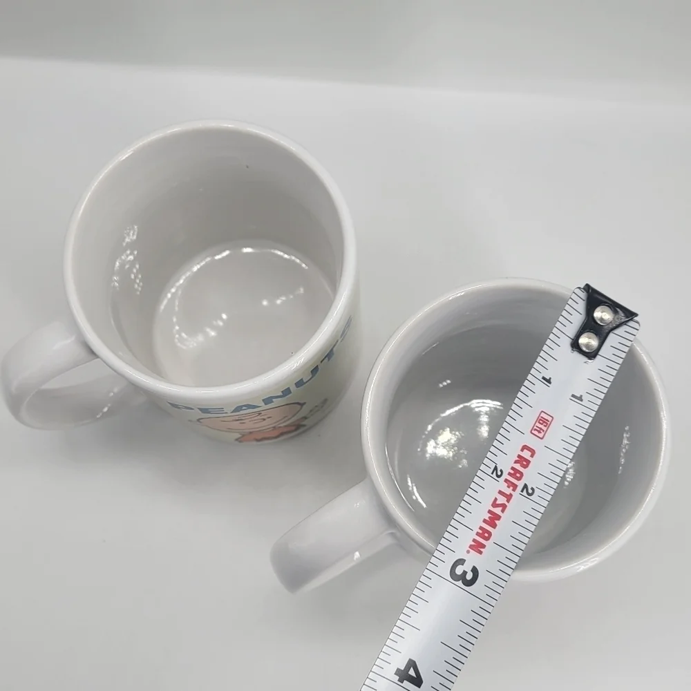 Lot of 2 Mugs Peanuts 2016 Worldwide LLC Multicolor Solid White 16 oz